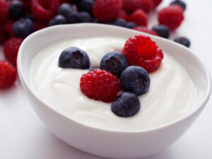treating constipation with yogurt is simple with a bowl of natural yogurt less the berries. just eat them