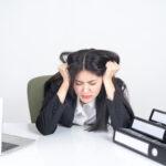 depicts a woman in need of chronic stress management