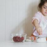 young girl making yogurt at home 