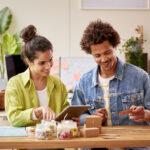 pic of young couple in kitchen planning meals for candida diet
